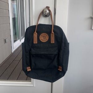Fjallraven cmBlack Canvas Backpack with Brown leather Accents